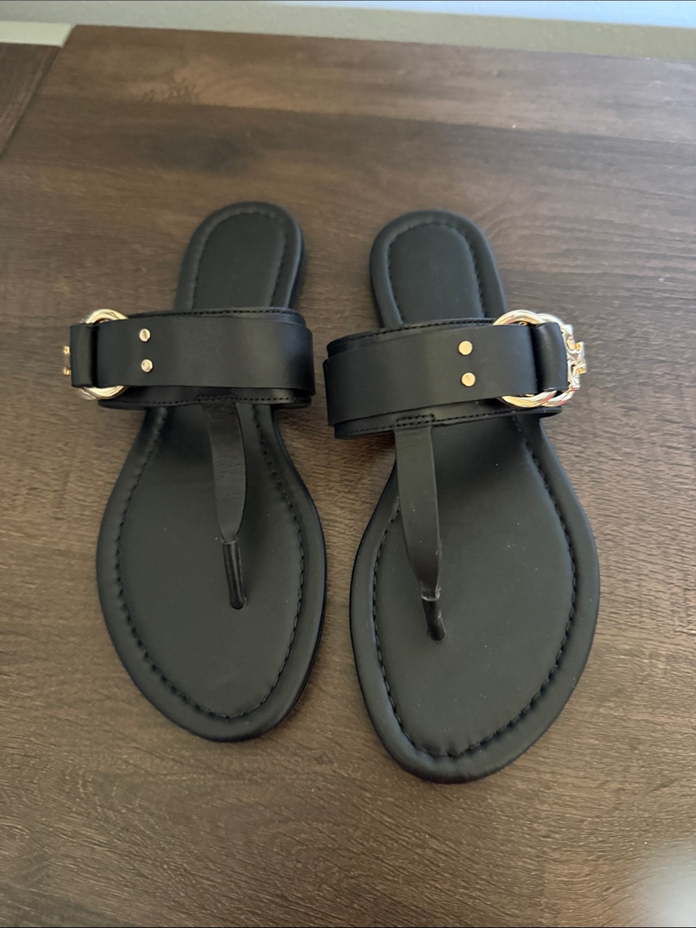 Tory Burch Black Thong Sandals with Gold Buckle